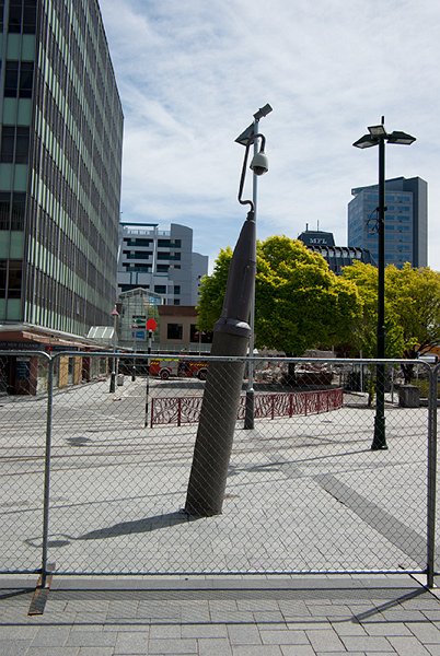 IMGP6661.jpg - This camera pole has become a bit crooked.  The building at left is having its future decided by its insurers (as mentioned in an earlier photo), the carpark building behind it is to be demolished, the MFL building at centre-right is to be demolished, and the tower at far right is probably going to be repaired but they seem to keep changing their minds.  I wouldn't work in it: all but two of its flights of stairs collapsed.