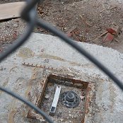 Strange place to see a safe but it looks intact.  I wonder what's inside.