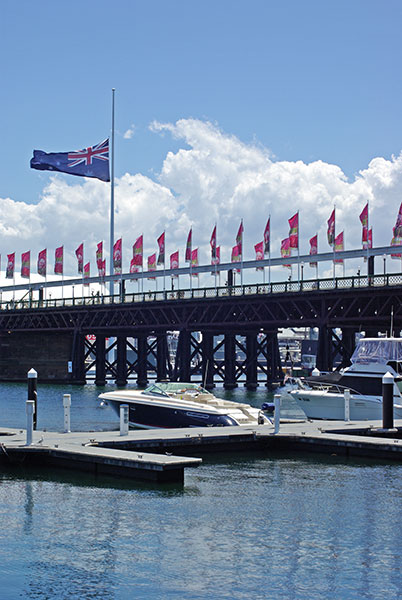 IMGP4712.jpg - The big flag in Darling Harbour was also at half mast for the Pike River mine disaster in NZ