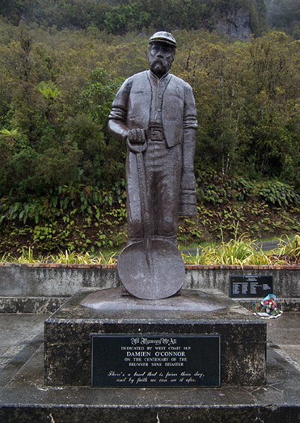 IMGP6615.jpg - A memorial of the Brunner mine disaster, at the old Brunner mine site.  In the background is a plaque for the Pike River disaster with freshly-laid flowers.